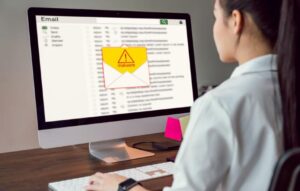 Women checking email finds spam