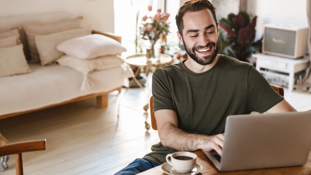 man working from home on laptop