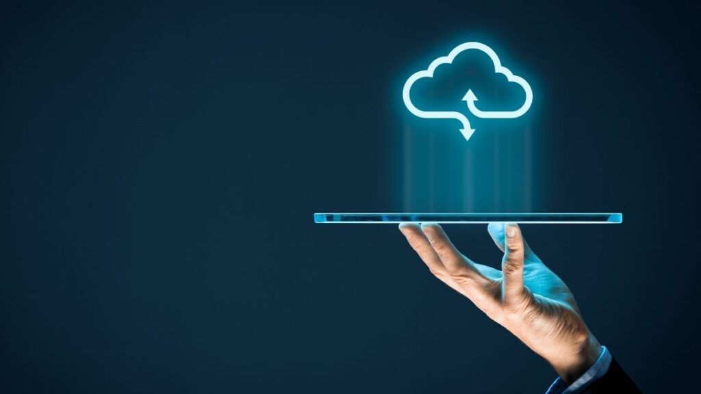 glowing cloud symbol hovering above tablet