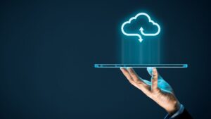 glowing cloud symbol hovering above tablet