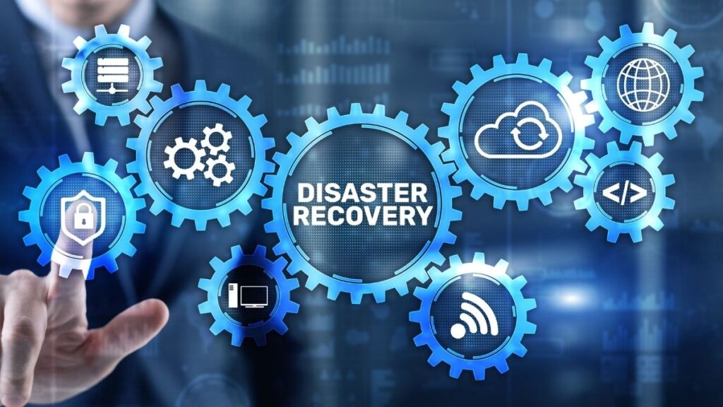 several glowing cog wheels with the words disaster recovery inside