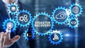 several glowing cog wheels with the words disaster recovery inside
