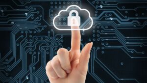woman's hand pressing lit up symbol of a cloud and a padlock